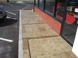 Dornbrook Construction's sidewalks will be your customer's first impression A concrete sidewalk installation from Dornbrook Construction at a Milwaukee Business