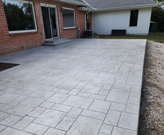 Stamped concrete patio construction for Brookfield homes